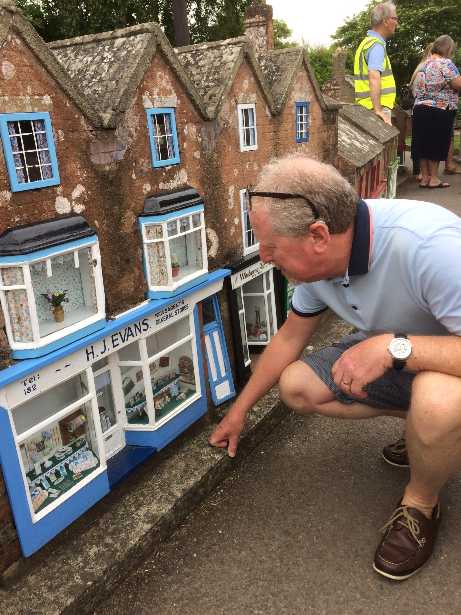 shaun forward at his grandfather's shop in wimborne model town